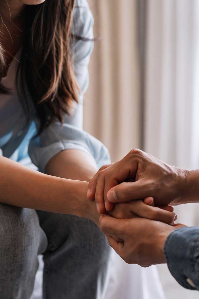 Choices Women’s Center: Unplanned Pregnancy Support Two women comforting each other